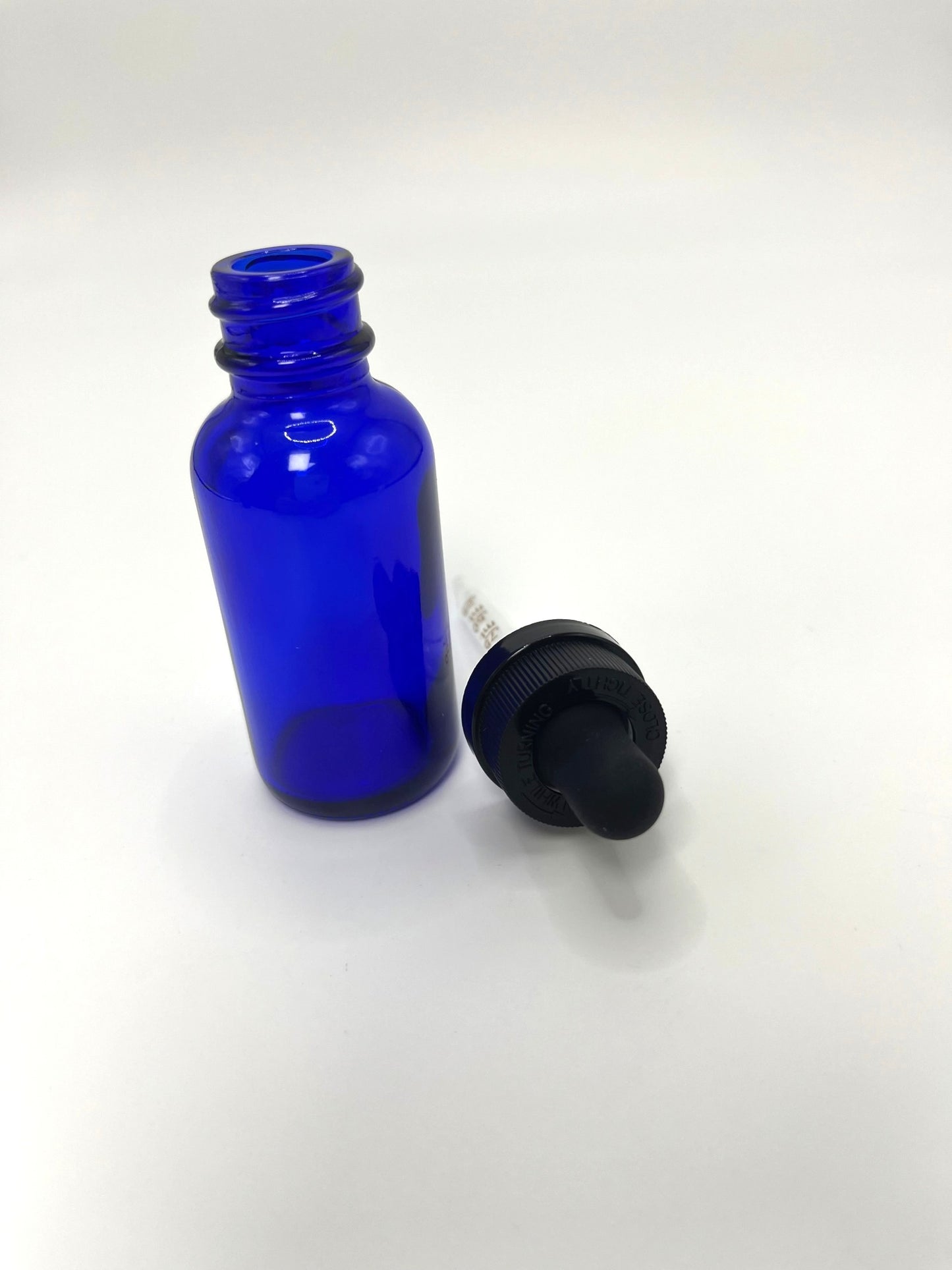1 oz Cobalt Blue Boston Round Bottle with Graduated CR Glass Dropper
