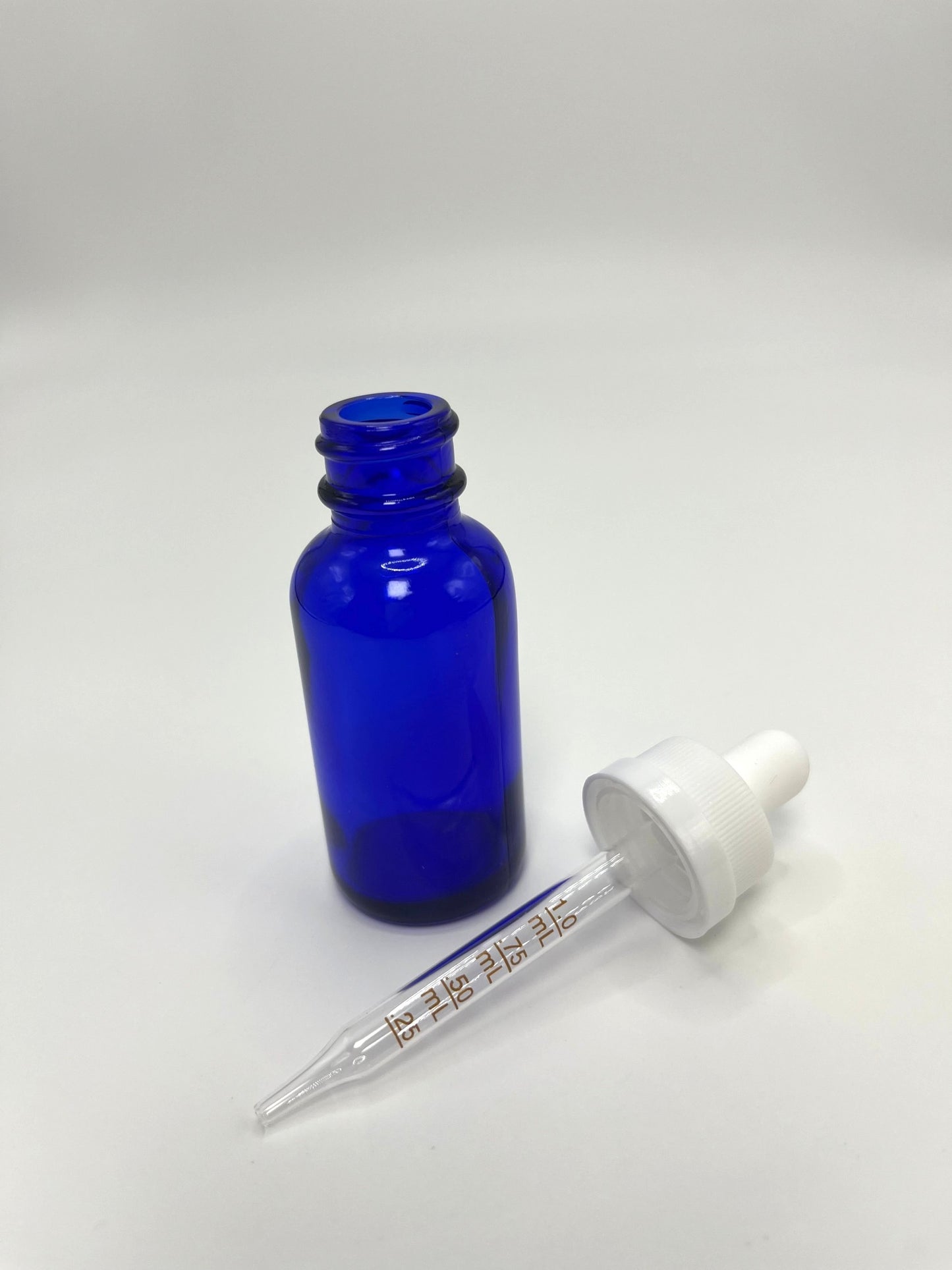 1 oz Cobalt Blue Boston Round Bottle with Graduated CR Glass Dropper