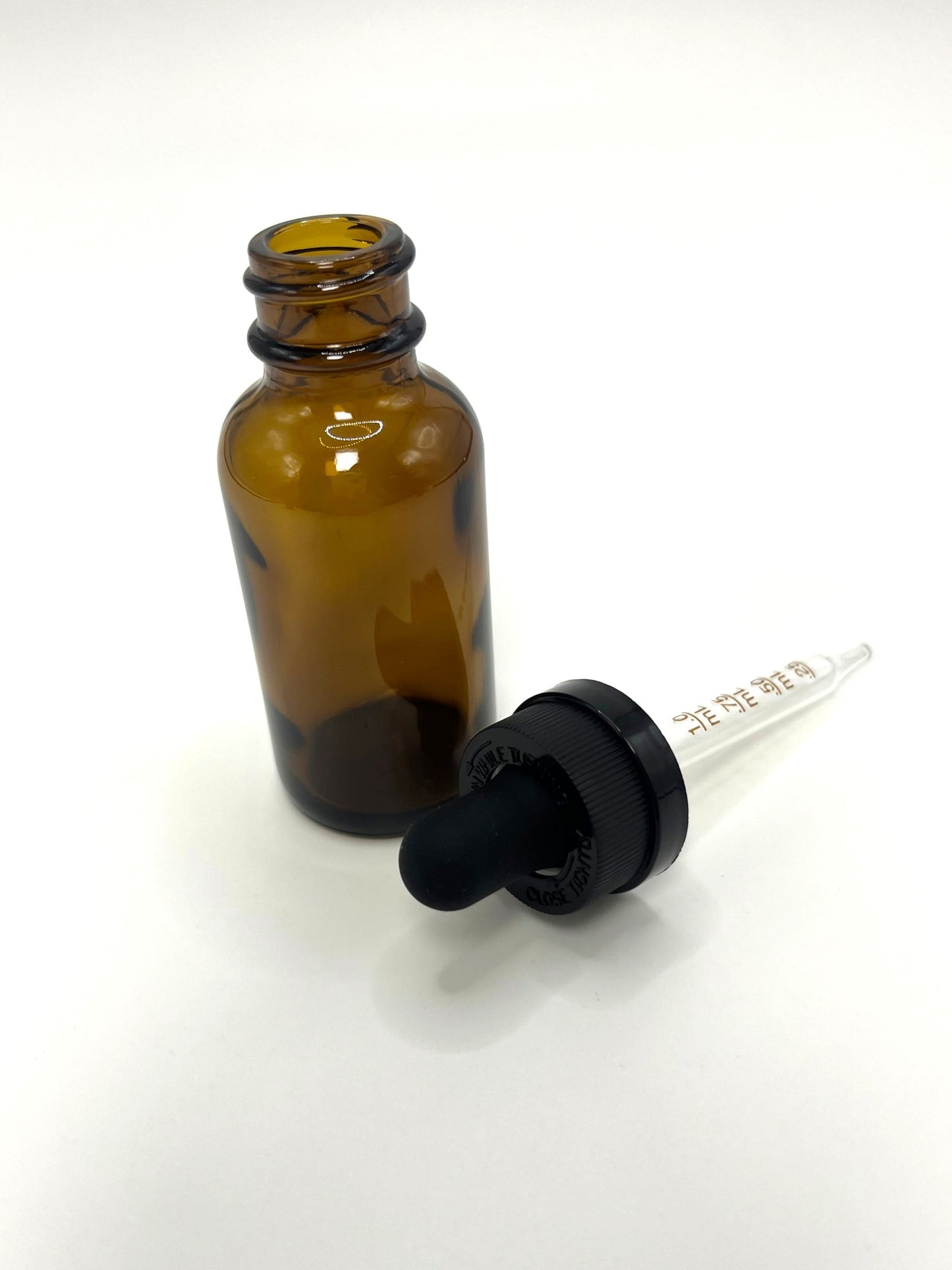1 oz Amber Boston Round Bottle with Graduated CR Glass Dropper
