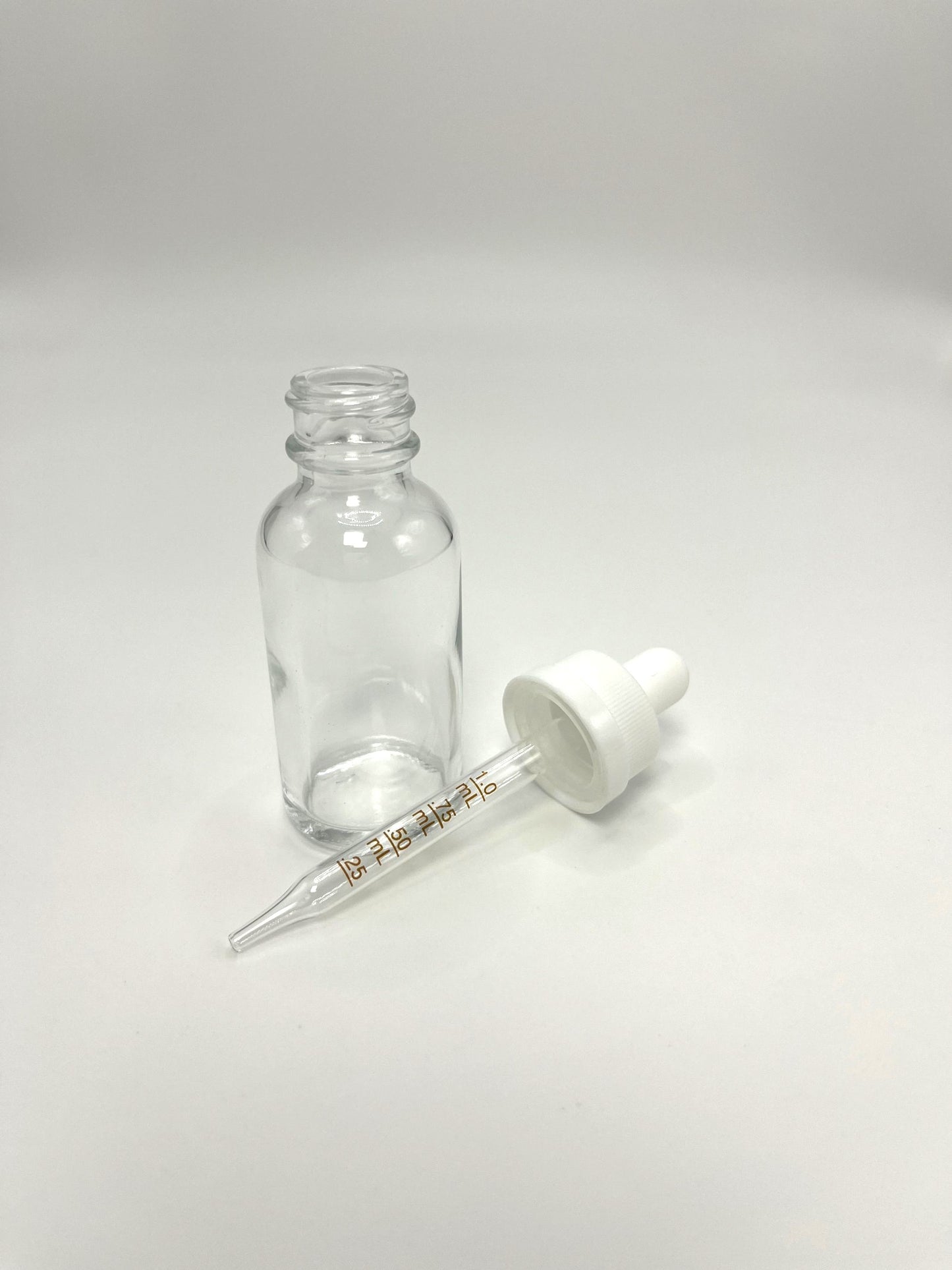 1 oz Clear Boston Round Bottle with Graduated CR Glass Dropper