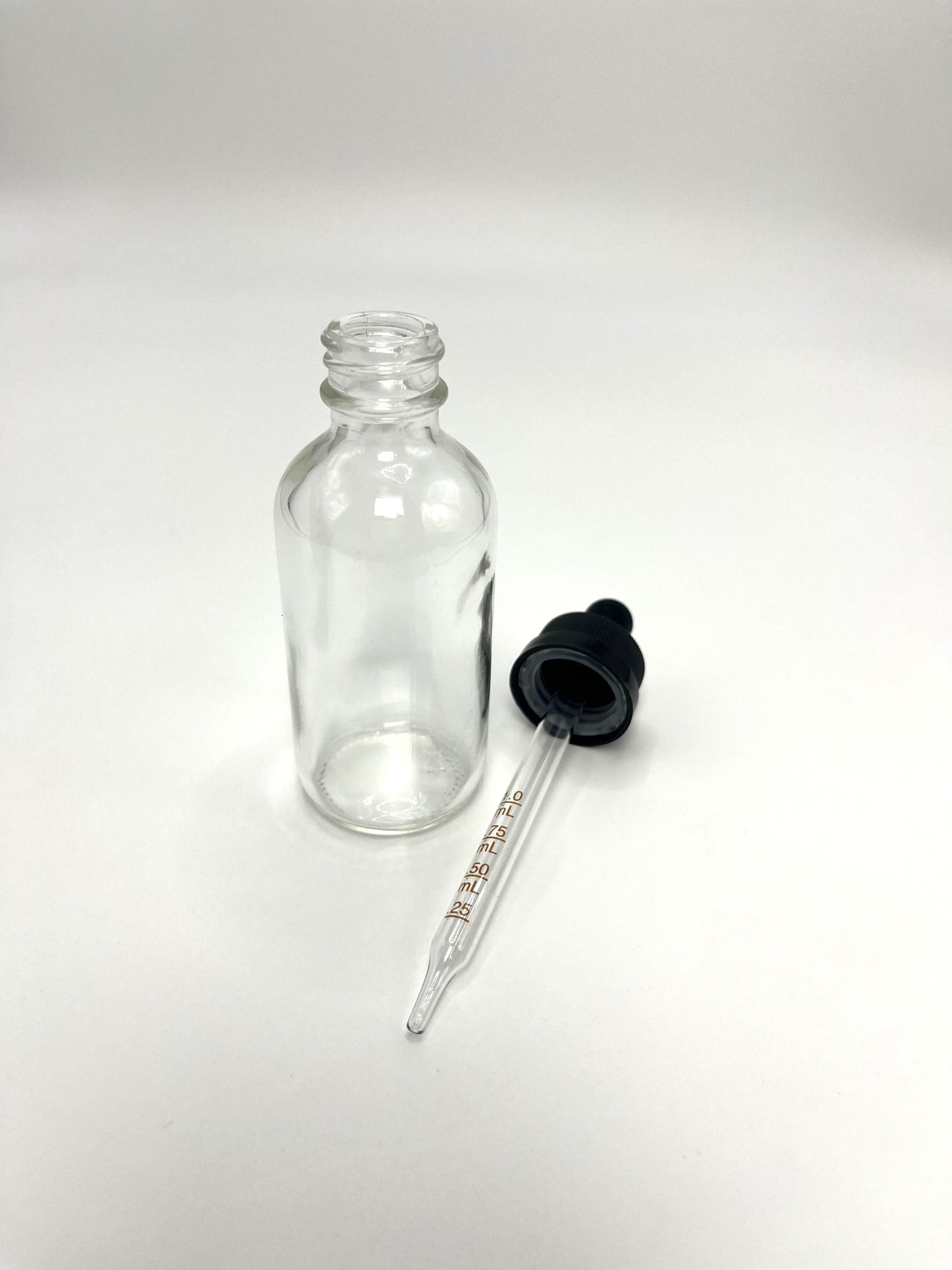 2 oz Clear Boston Round Bottle with Graduated CR Glass Dropper