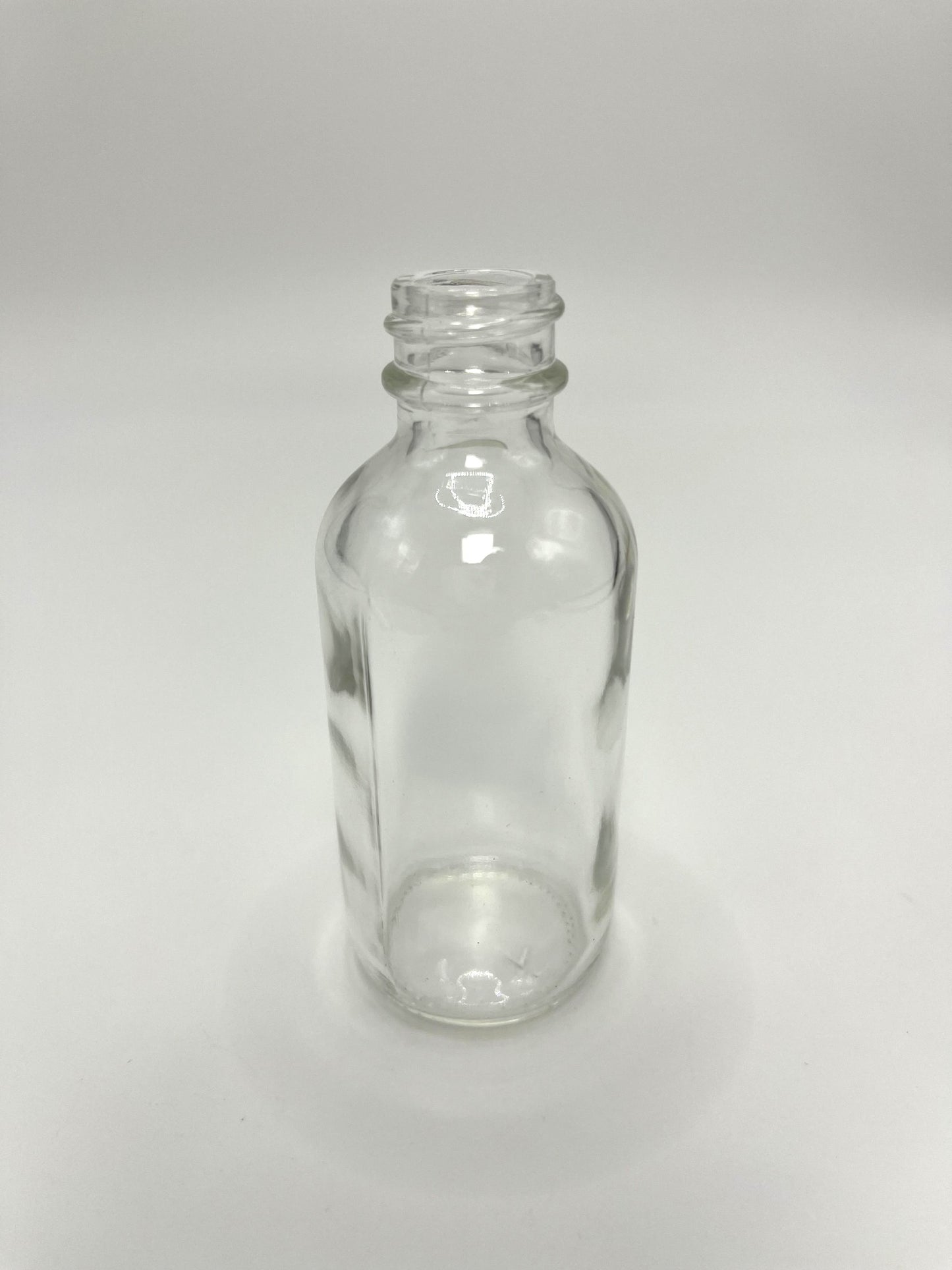 2 oz Clear Boston Round Bottle with Graduated CR Glass Dropper