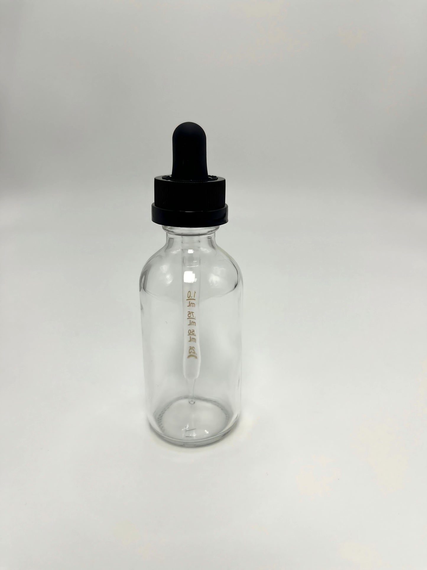 2 oz Clear Boston Round Bottle with Graduated CR Glass Dropper