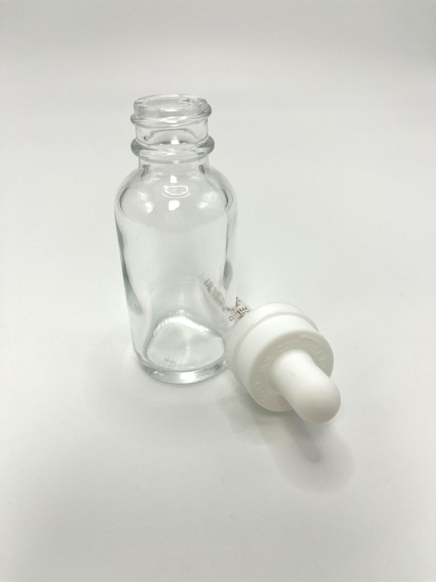 1 oz Clear Boston Round Bottle with Graduated CR Glass Dropper