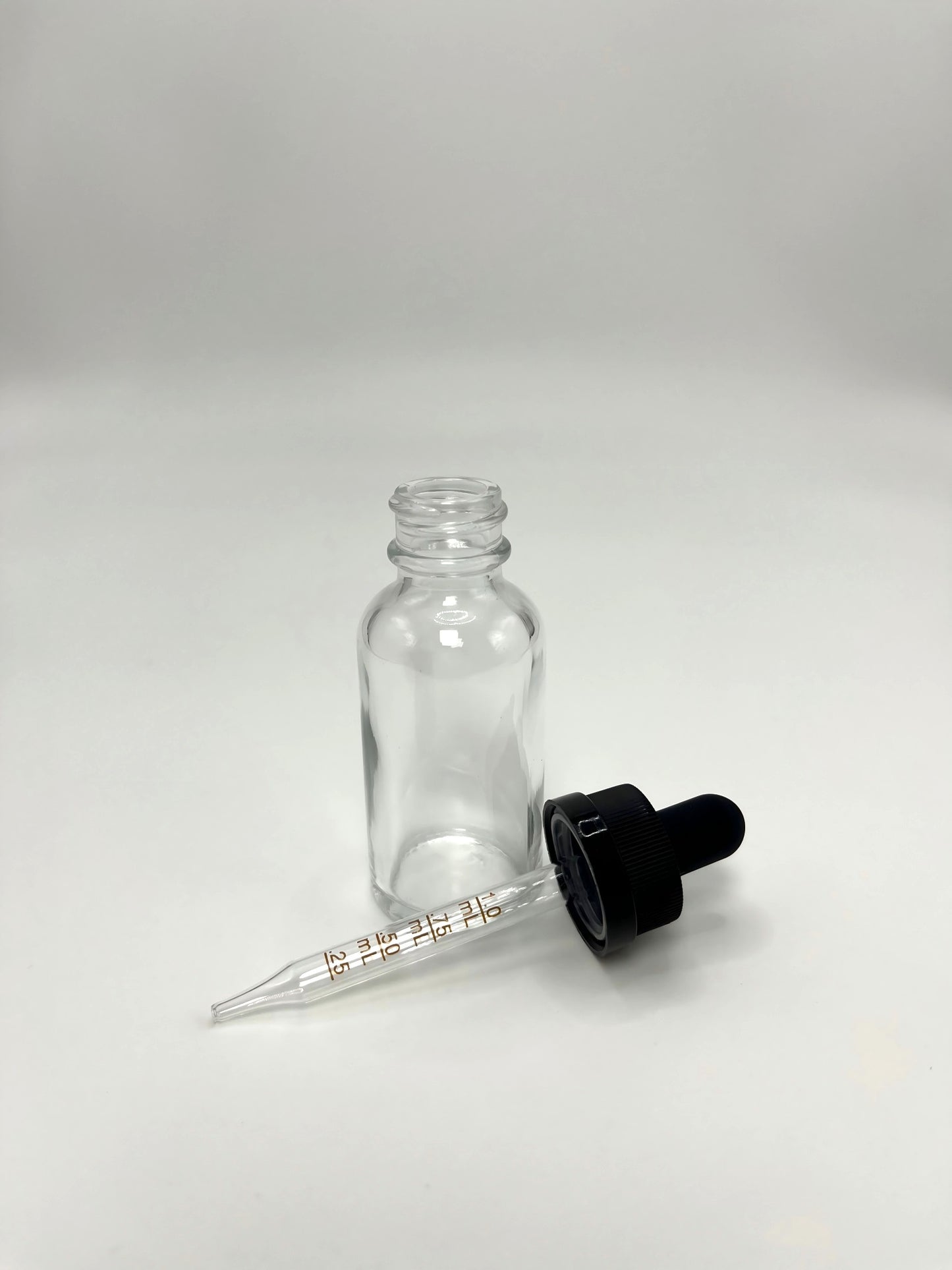 1 oz Clear Boston Round Bottle with Graduated CR Glass Dropper