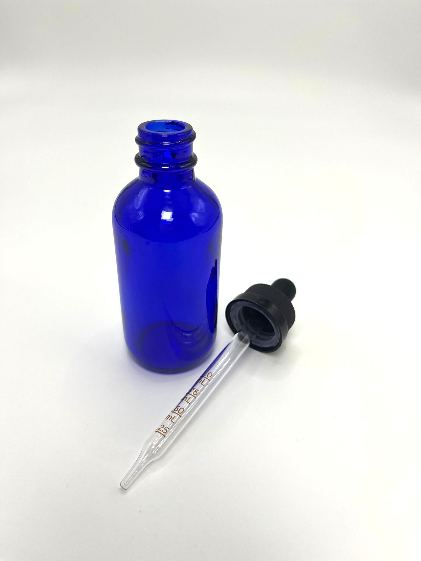2 oz Cobalt Blue Boston Round Bottle with Graduated CR Glass Dropper