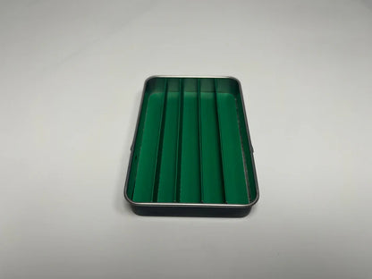 Vibrant green cardboard divider insert for pre-roll packaging