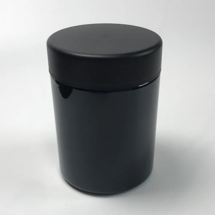 Black opaque glass jar designed to protect cannabis flower from light exposure