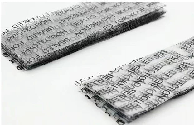 Transparent shrink bands printed with “Sealed For Your Protection” for secure packaging