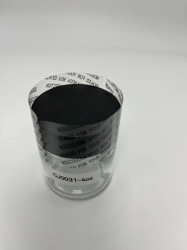 Transparent shrink band applied to 53-400 cannabis jar for secure packaging