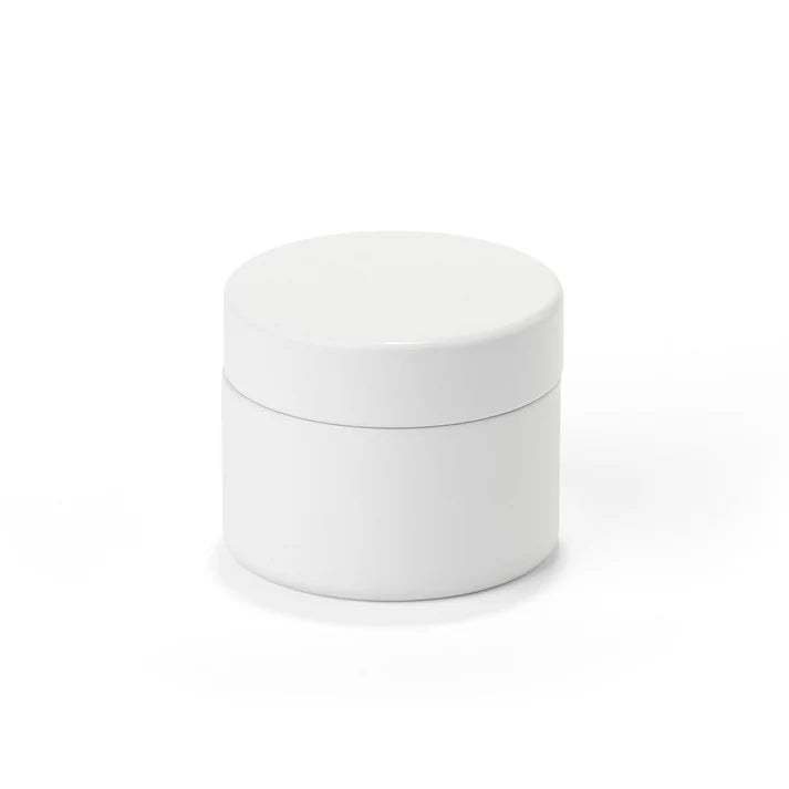 White tin jar with minimalist design for premium cannabis packaging